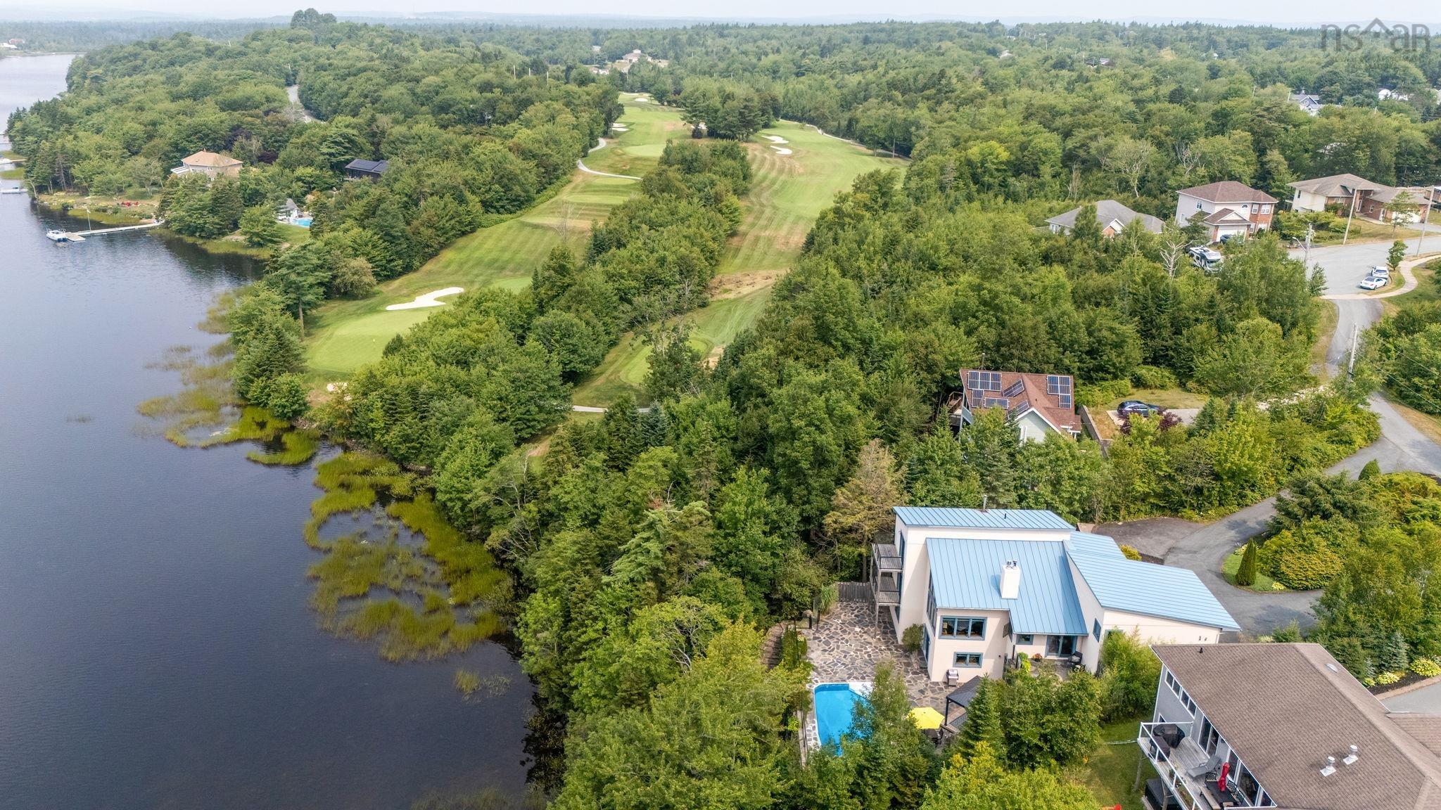 Aerial view of a large body of water and a golf club