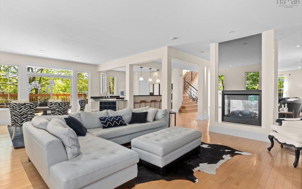 Living area featuring light wood-type flooring and recessed lighting