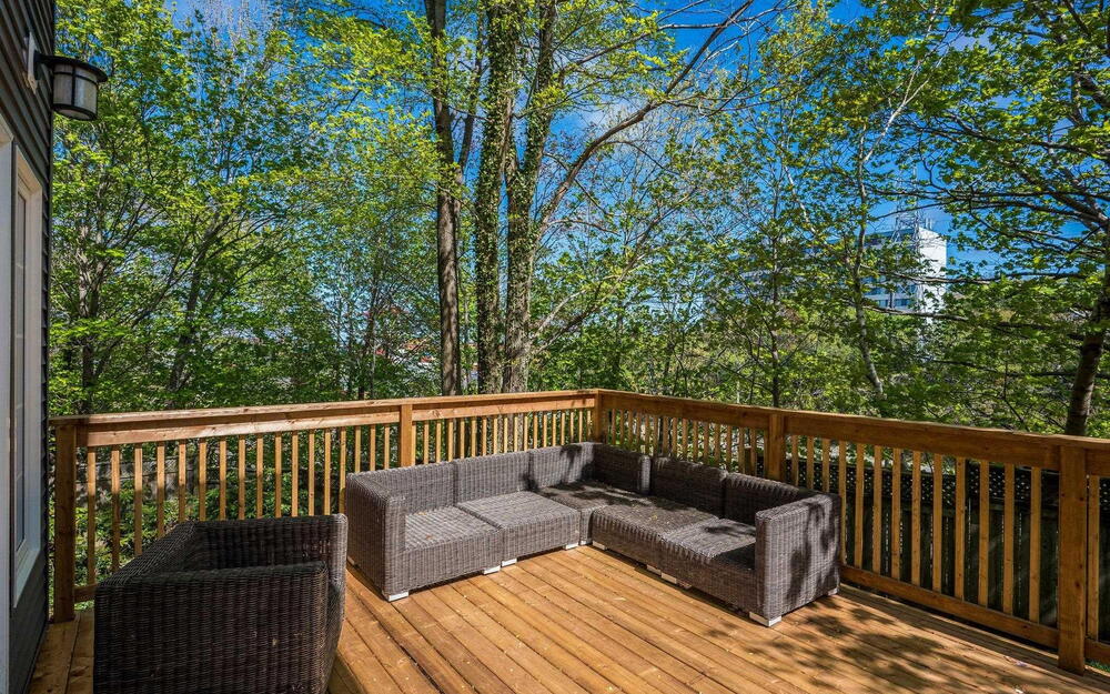 Wooden deck featuring an outdoor hangout area