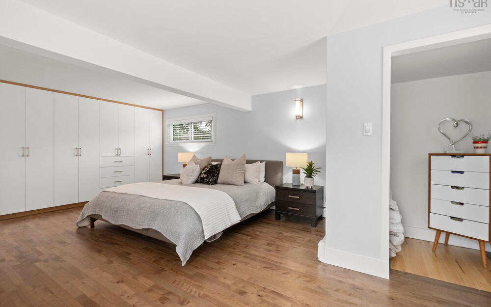 Bedroom with wood finished floors