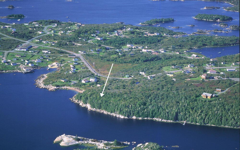 View of property location with a nearby body of water