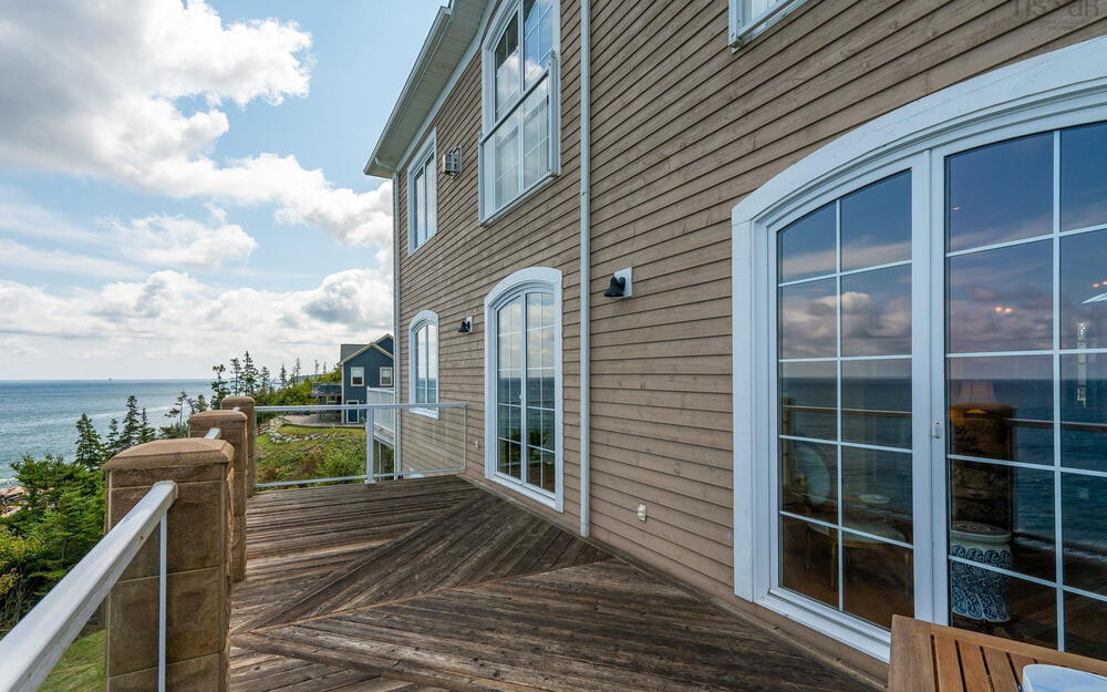 Deck featuring a water view